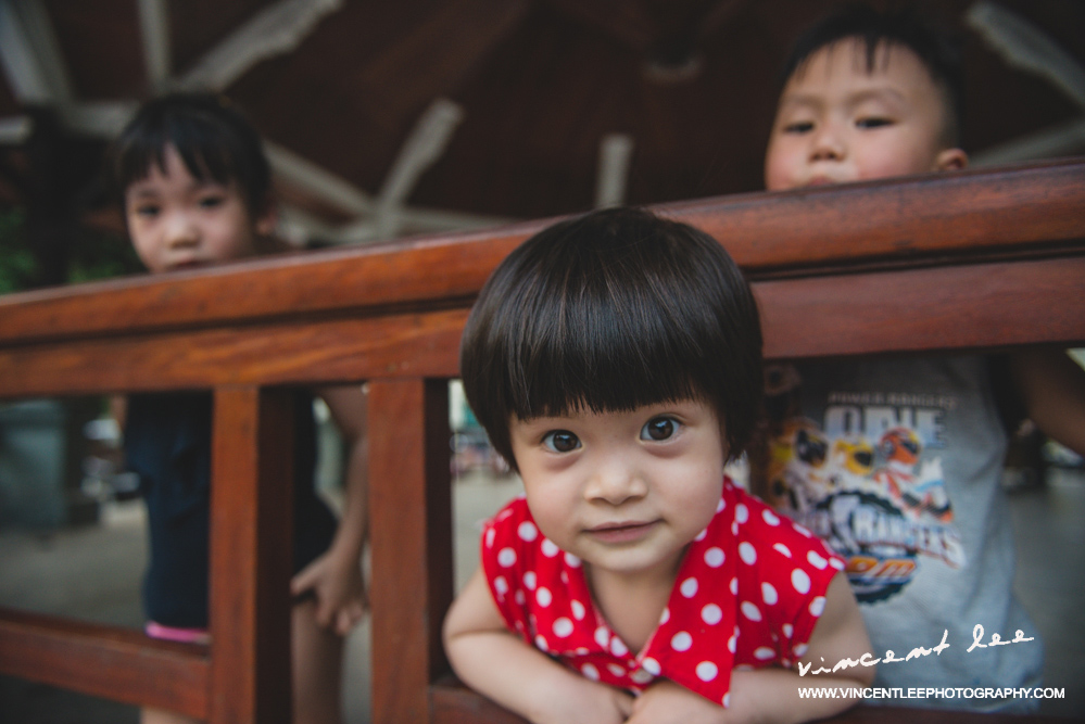 A very cute little girl curious with my big lens 