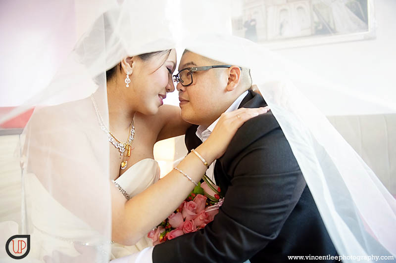 bride and groom share a moment of their joy of their wedding day