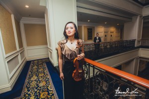 Love this photo too, of both the bride and groom , both musicians.